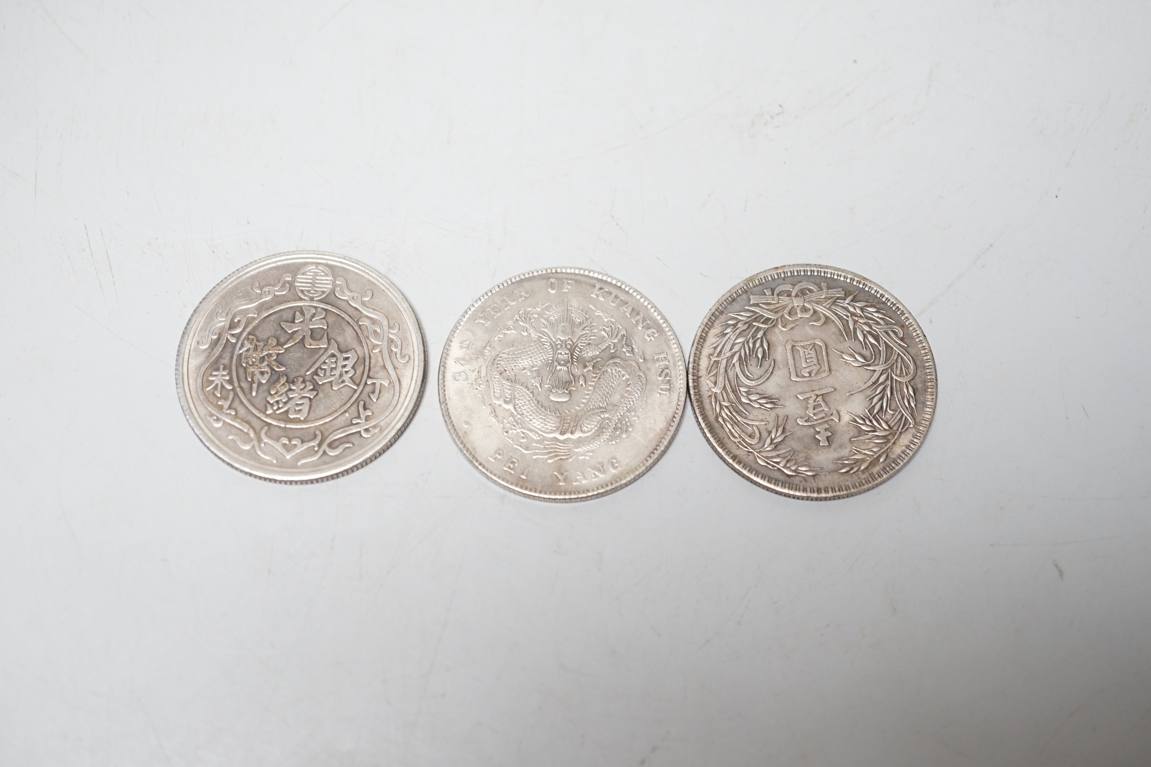 Three Chinese coins